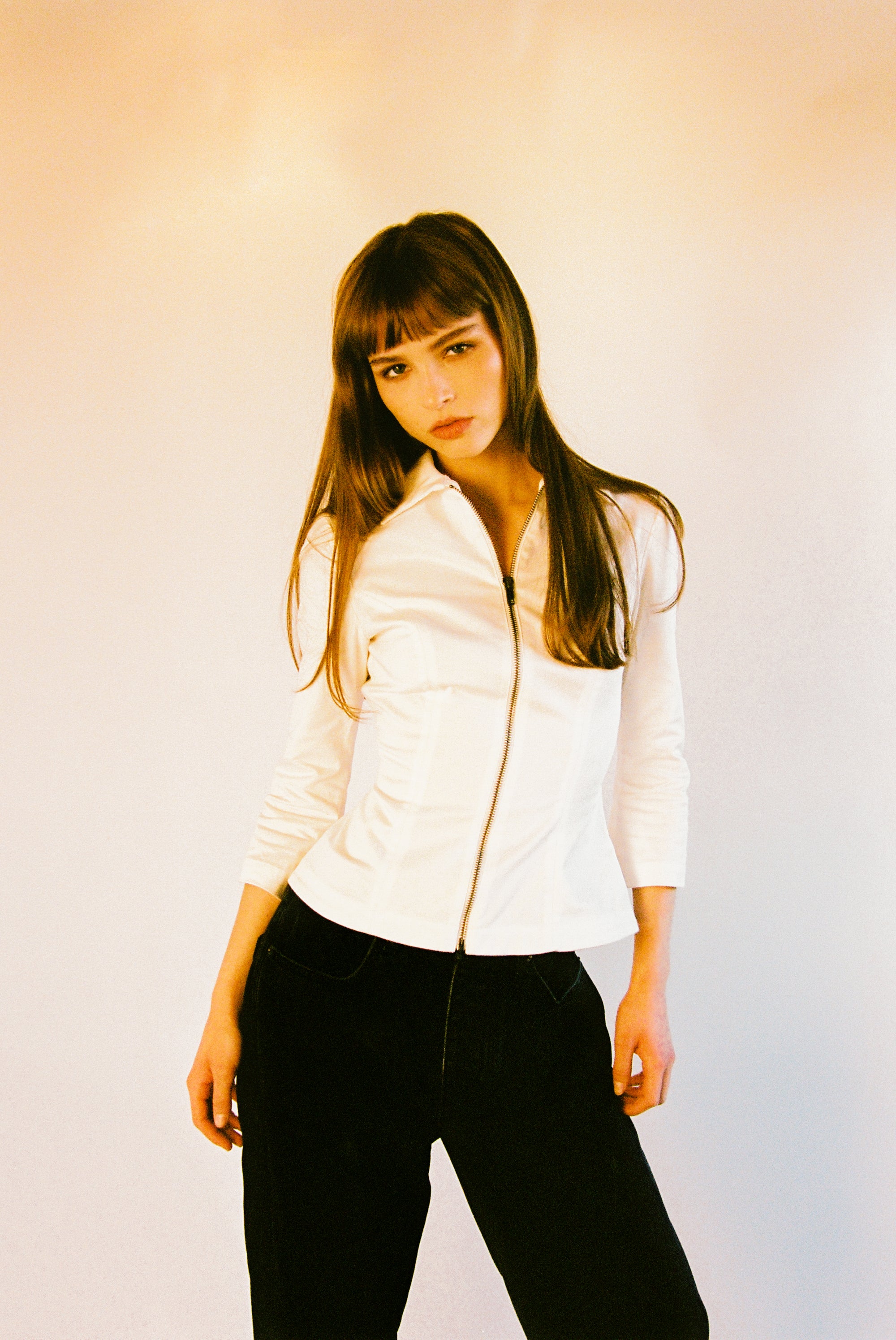 THE CURVE ZIP UP